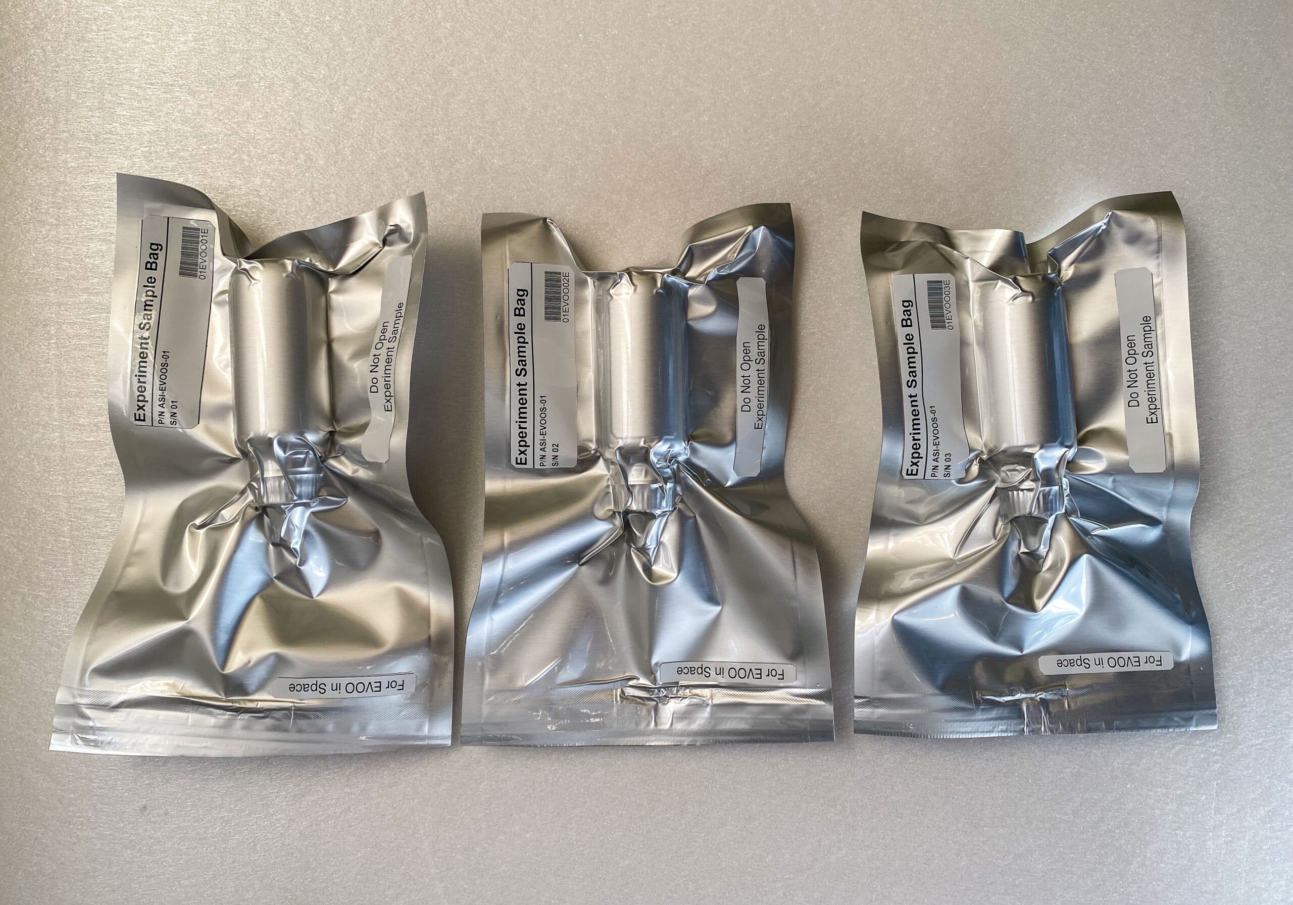 Extra-Virgin Olive Oil in Space (EVOOS) samples vacuum sealed and labeled ready for shipment to NASA for launch. Image courtesy of Stefano Polato.